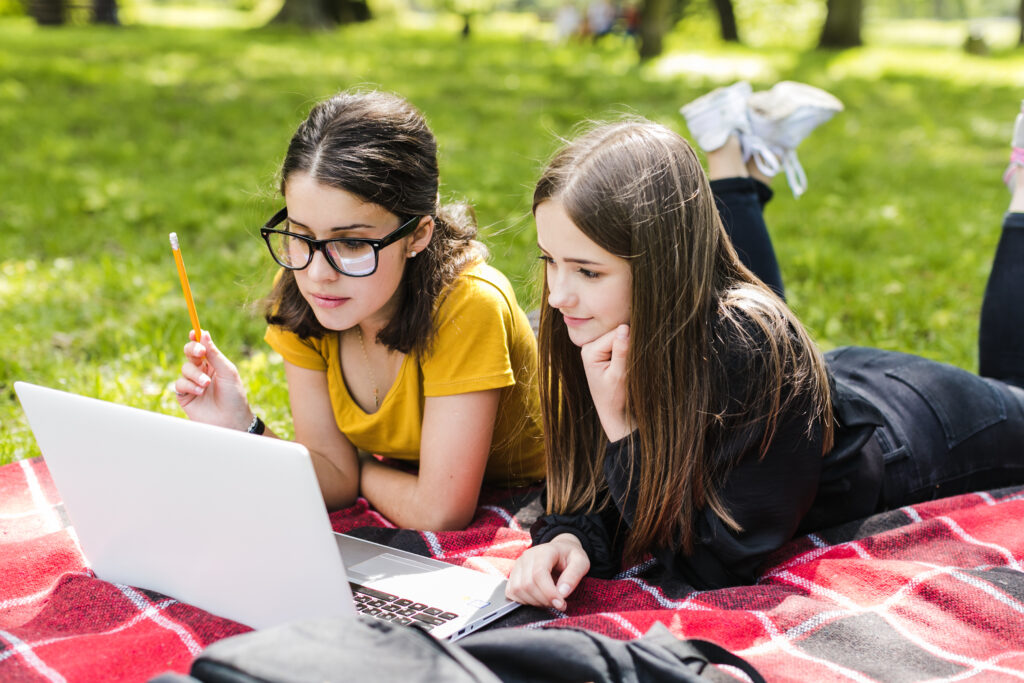 girls studying with laptop scaled