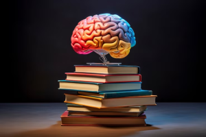 um objeto no formato de cerebro em cima dos livros